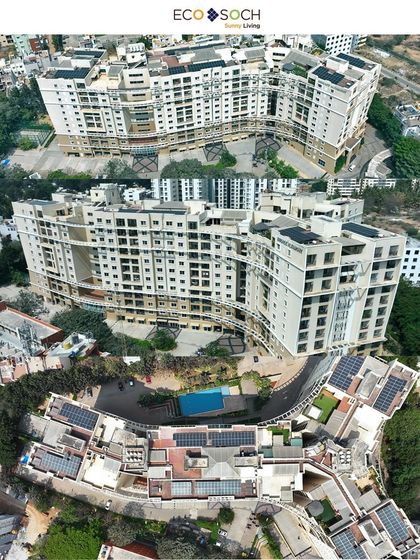 A curved apartment building with an extensive rooftop solar panel system. Our drones can navigate complex architectural shapes to provide a complete visual record.
