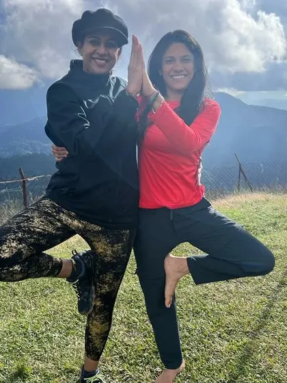 Sharing a moment of balance and friendship during our Nepal yoga retreat. The joy of practicing together in such a serene environment is truly special.