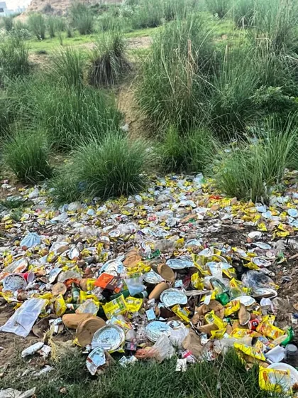 A heartbreaking sight of a large pile of plastic and other non-biodegradable waste dumped in the middle of the lush green Aravallis. This is what we work to prevent.