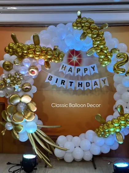For a unique 21st birthday, we designed this custom dragon-themed balloon ring. The white balloon ring is accented with intricate golden balloon-twisted dragons, creating a powerful and memorable photo backdrop.