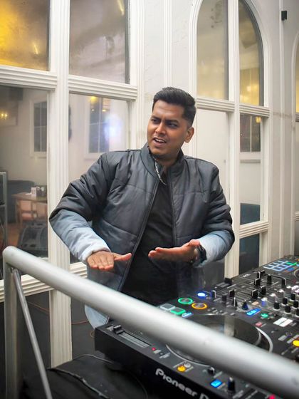 Having fun on stage is contagious. If I'm enjoying myself, the crowd feels it too. Here I am, getting into the groove at Grey Cravings.