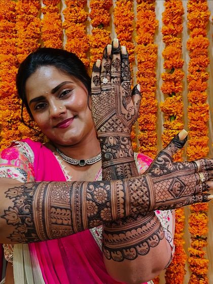 The beautiful makeup artist Tejashree as a bride, looking absolutely stunning with her full bridal mehendi.