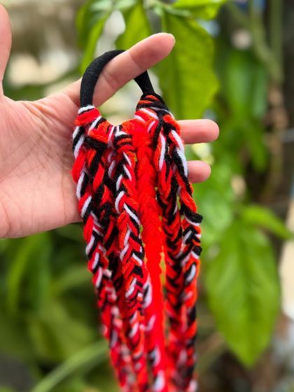 A classic red, white, and black combination for our braided hair strings.