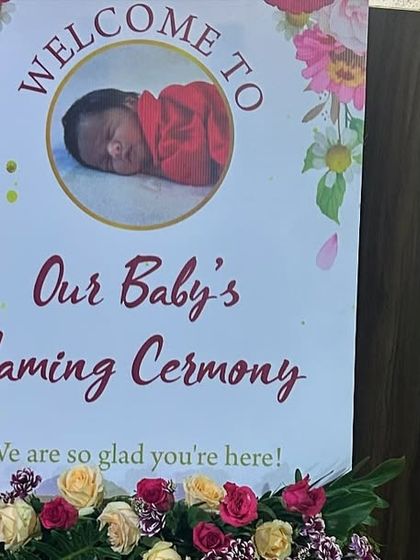 A sweet and personal welcome sign for a baby's naming ceremony, featuring a photo of the newborn.