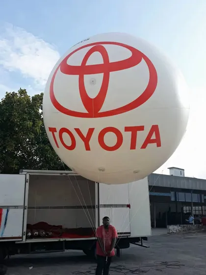 I help brands make a big statement with custom advertising solutions. This giant inflatable PVC balloon with the Toyota logo is a powerful way to grab attention at outdoor corporate events, product launches, or dealership promotions.