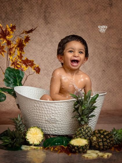 This is so much fun! The pure joy on this little boy's face as he splashes in his pineapple-themed bath is priceless.