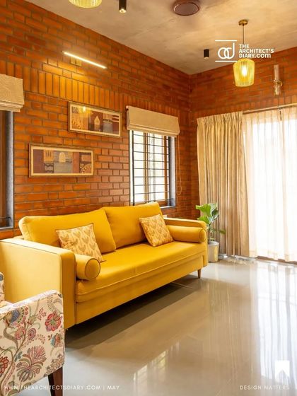 Another shot of the same living room, emphasizing the natural light and cozy feel.