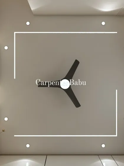 A minimalist false ceiling design with clean, linear lighting. This adds a modern, graphic element to the room without being overpowering.