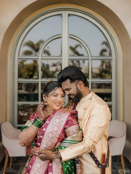 A romantic couple shot highlighting the bride's radiant smile and soft makeup.