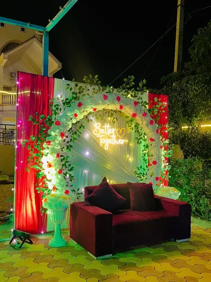 The 'Better Together' backdrop with green and white lighting.