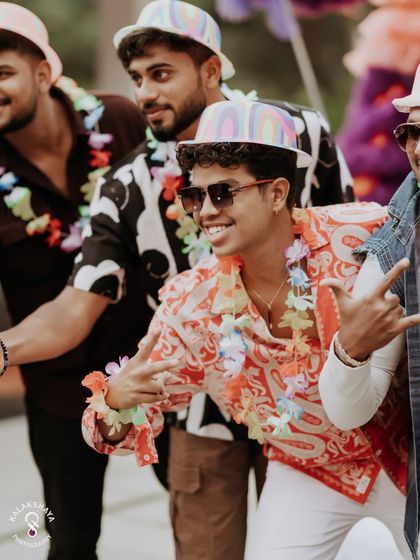 A guest showing off his moves at the carnival-themed wedding party.