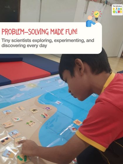 We make problem-solving fun by turning kids into tiny scientists. In this activity, a child is sorting items on a map, learning about categories and placement. Every day involves exploring, experimenting, and discovering something new.