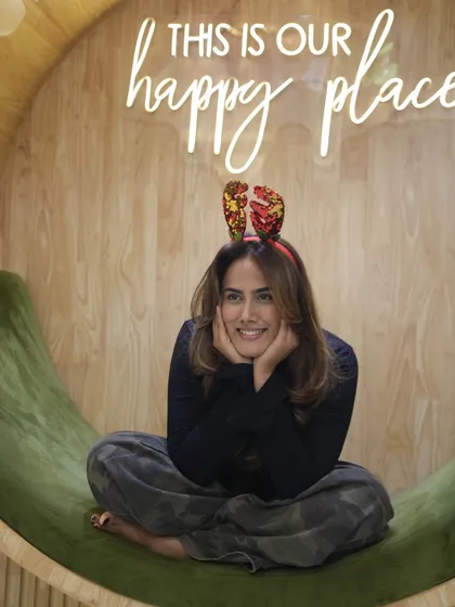 A beautiful portrait in our "happy place" chair, with her hair perfectly styled to frame her face.