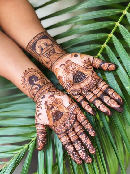 Another beautiful Karwachauth design. This set features a couple on the palms, with traditional swan and peacock motifs on the wrists, blending romance with classic art.