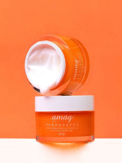 A bold, monochrome orange background makes this hydrating face creme pop. By stacking the jars, I created a balanced, geometric composition that showcases the product's creamy texture and vibrant packaging.