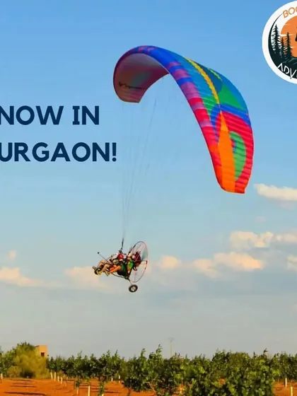 Soaring high with a vibrant, colorful parachute during a paramotor flight. This activity is perfect for an afternoon of adventure, offering an easy and exhilarating flying experience without needing any prior training.