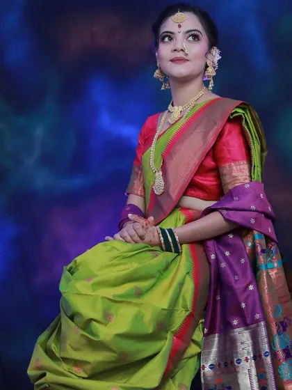 A full-length shot of a Maharashtrian bride created by a student, showcasing the complete look with saree draping.