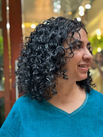 More examples of my short curly haircuts, from bobs to layered chops, each one personalized to the client's curl pattern and face shape.