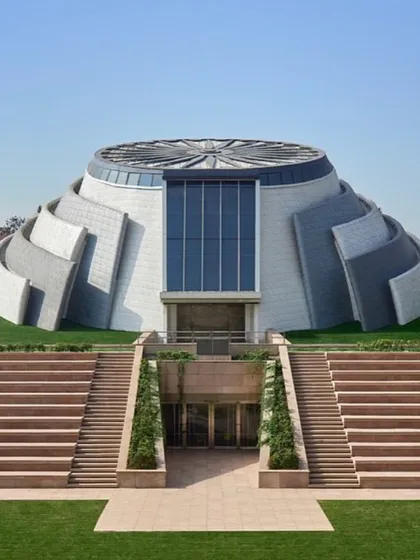 The exterior of the Pradhanmantri Sangrahalaya, a national museum for which I was a lead designer. This project, a winning entry in a global design competition, stands as a symbol of modern India, featuring a distinctive, powerful form set within a sunken landscape.