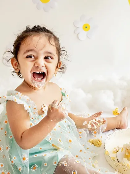Nothing says "I'm one!" quite like a face full of cake. My cake smash sessions are all about fun and capturing your little one's personality as they celebrate their first big milestone.