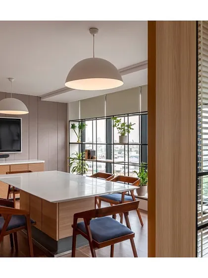 A private dining room within the IHCL office, featuring a custom table and chairs. The space can also be used for meetings, offering a flexible solution for the client's needs.