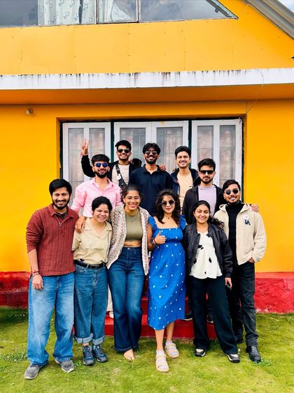 Our group posing in front of our vibrant yellow homestay in Kodaikanal. We always ensure a comfortable and scenic stay.
