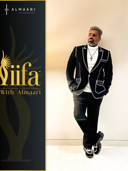 A closer look at the custom-styled blazer for choreographer Caesar at the IIFA awards. The white piping detail creates a graphic, modern effect that stands out on the red carpet.