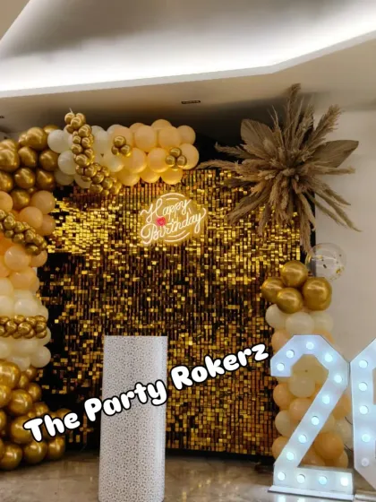 The 26th birthday setup with a pedestal for the cake, showing how all the elements come together to create a stunning focal point for the party.