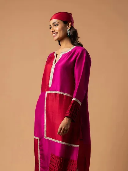 A bright and happy look for a clothing brand. The makeup is clean and minimal, with a fresh-faced feel that complements the vibrant, colorful outfit.