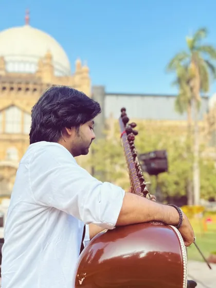 A moment of peace during a sound check at Vastu Sangrahalaya in Mumbai. The historic backdrop perfectly complements the timeless sound of the sitar.