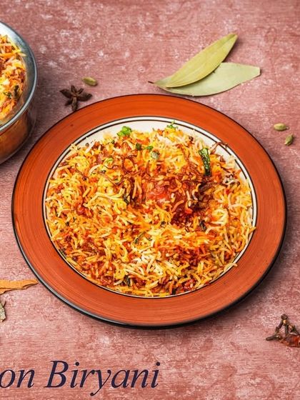 Our Mutton Biryani is a feast for the senses. We use tender mutton pieces and long grain basmati rice, slow cooked with aromatic spices for a rich and flavourful meal.