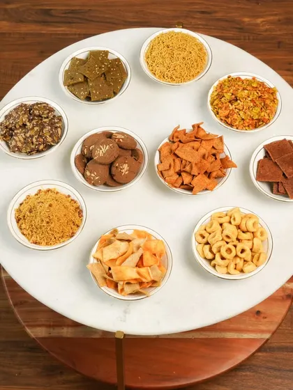 A top-down shot of an assortment of healthy snacks in bowls, creating a visually appealing flat-lay that showcases variety.