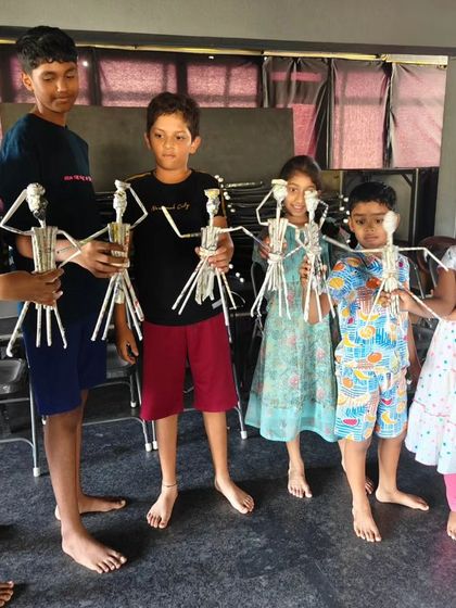 A different group of children with their unique puppet creations, showcasing the individuality and creativity we encourage.