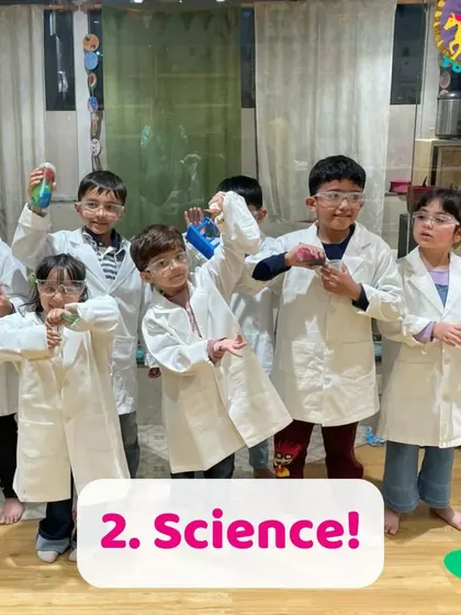 A group of young scientists ready for action. Working in a group, they learn to follow instructions, observe results, and share in the excitement of discovery.