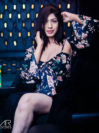 A guest posing at the bar.