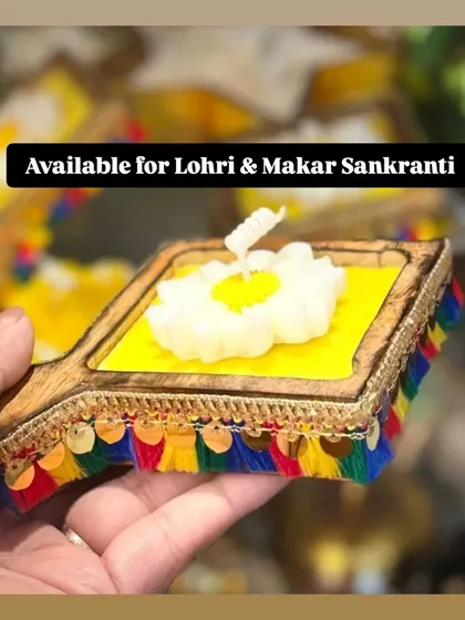 Celebrate Lohri and Makar Sankranti with this unique kite-shaped wooden candle tray. It's a vibrant and festive piece, perfect for adding a traditional touch to your celebrations.