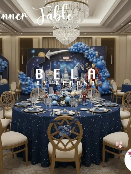 A full view of the guest dining area, where every table is themed. The starry blue tablecloths, matching chair decor, and view of the main stage ensure an immersive experience from every seat in the room.