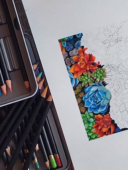 The very first WIP shot of the succulents, showing the initial colored section next to my tin of Derwent pencils.