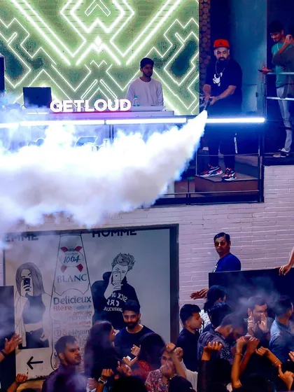 Blasting the CO2 cannon to hype up the crowd at Loft38. The energy here is always explosive.