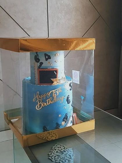 Safely packed and ready to go. For my large, multi-tier cakes, I use these special boxes to ensure they travel securely and arrive in perfect condition.