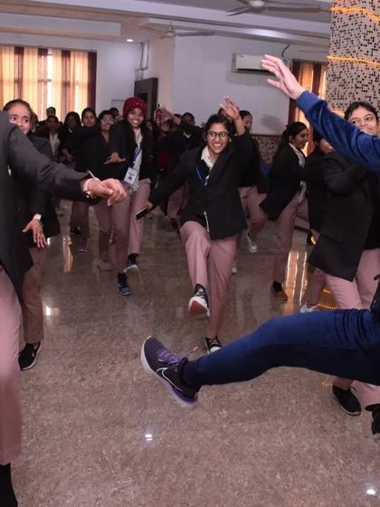 A fun, interactive moment with one of the students. Making fitness enjoyable is my primary goal.