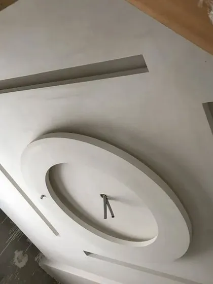 A simple, modern design with a central ring, ready for wiring and painting. This is a popular choice for bedrooms.