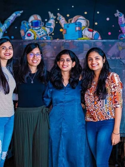 Another happy group enjoying the atmosphere at Antigravity Gastropub. The astronaut-themed decor adds a cool touch to the venue.