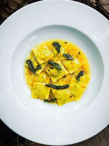 Our seasonal fresh harvest pea ravioli, served in a delicate butter sauce. This dish is a highlight of our special Christmas menu, celebrating the flavors of the season.