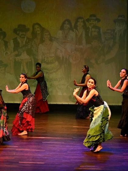 A dynamic group performance shot used to announce our new beginner belly dance batch in Koramangala.