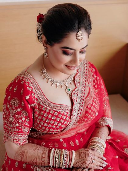 A quiet, candid moment. Sakshi's soft glam makeup looks flawless even in a relaxed pose, highlighting the importance of a well-prepped base.