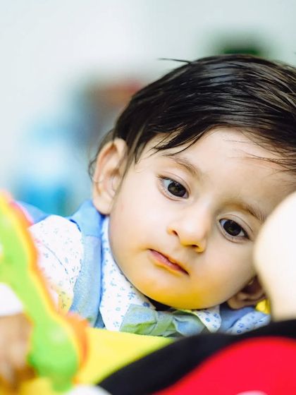 A thoughtful moment during Kiyansh's first birthday photoshoot. Even quiet, contemplative expressions tell a beautiful story about your child's first year.