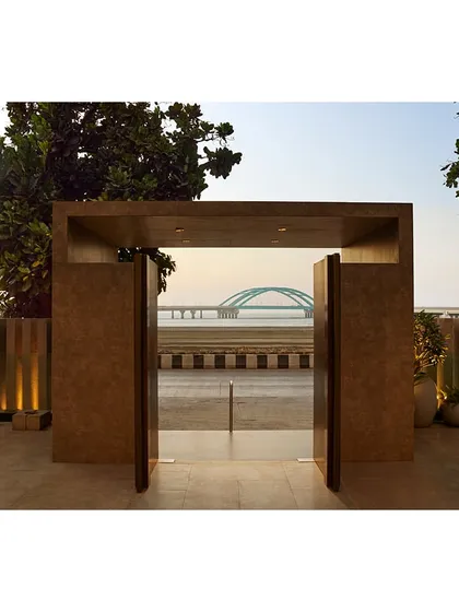 The entrance portal frames a perfect view of the Bandra-Worli Sea Link, connecting the venue to its iconic Mumbai location.