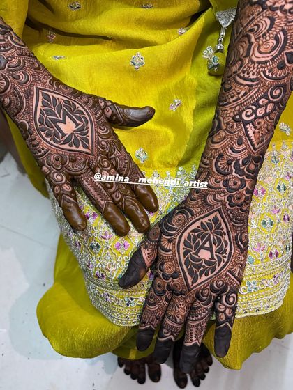 A close-up shot of the leaf-motif initials, showing the intricate details within the personalized elements.