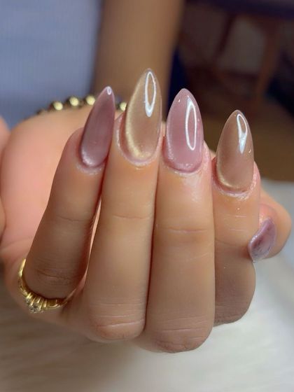 A close-up of the multi-tonal Korean glass cat eye nails.